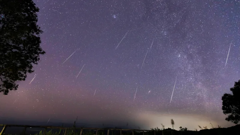 Geminid,Meteor,Shower,And,The,Milky,Way,Over,A,Mountain.