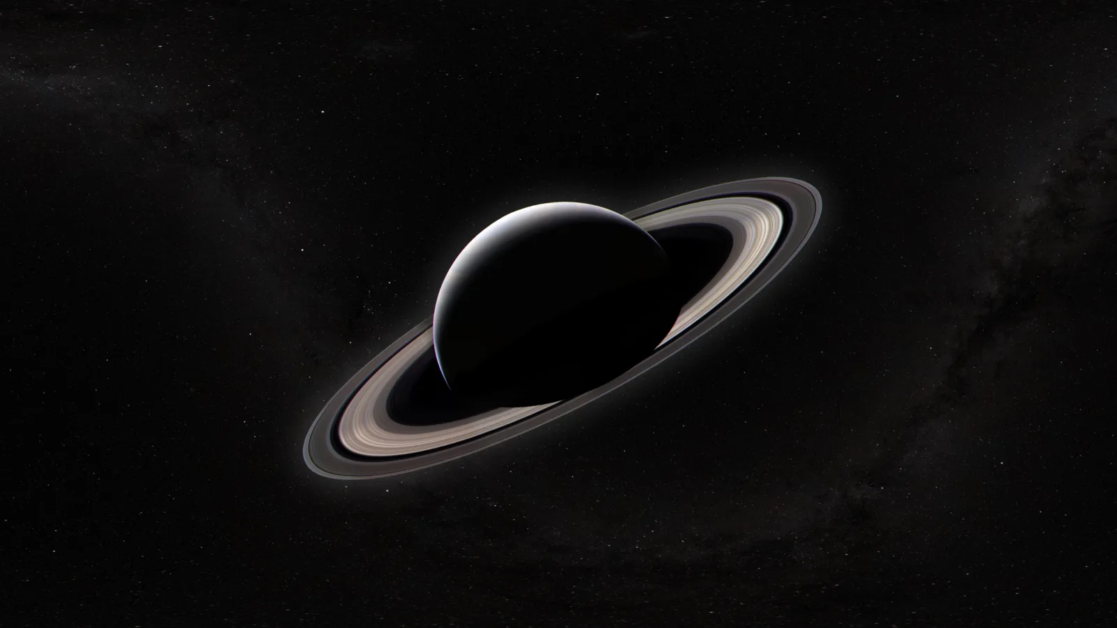 Saturn and its rings against the dark star field of space